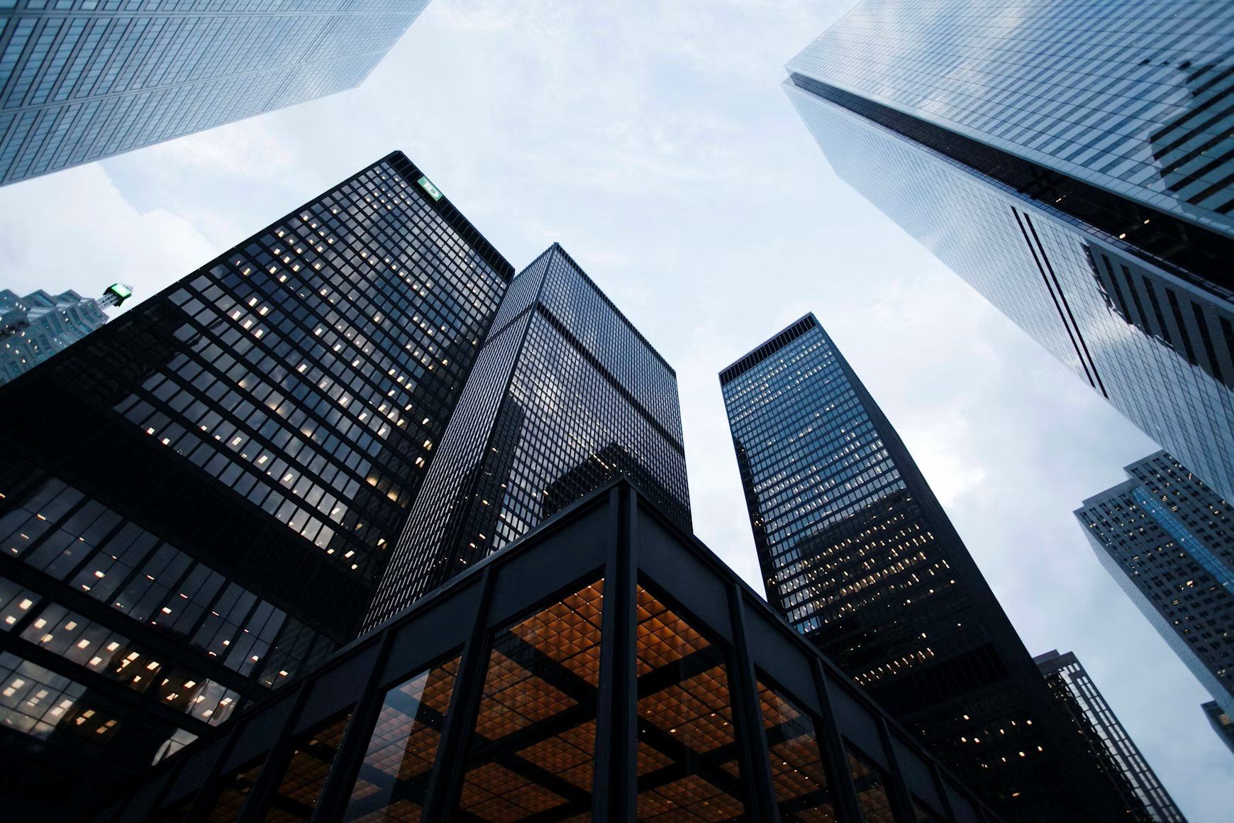Glass office towers seen from below